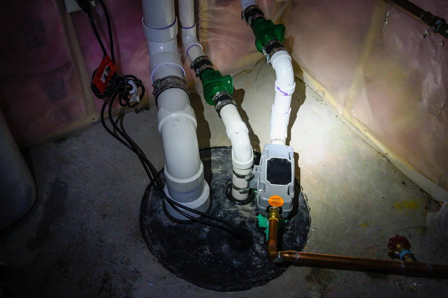 Professional plumber inspecting and fixing plumbing systems